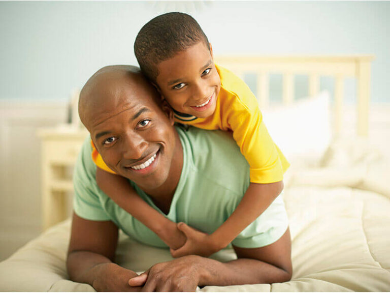 A Son Hugging His Father