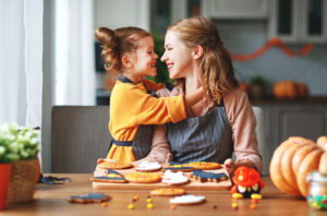 Mother And Daughter Staring At Each Other Happily
