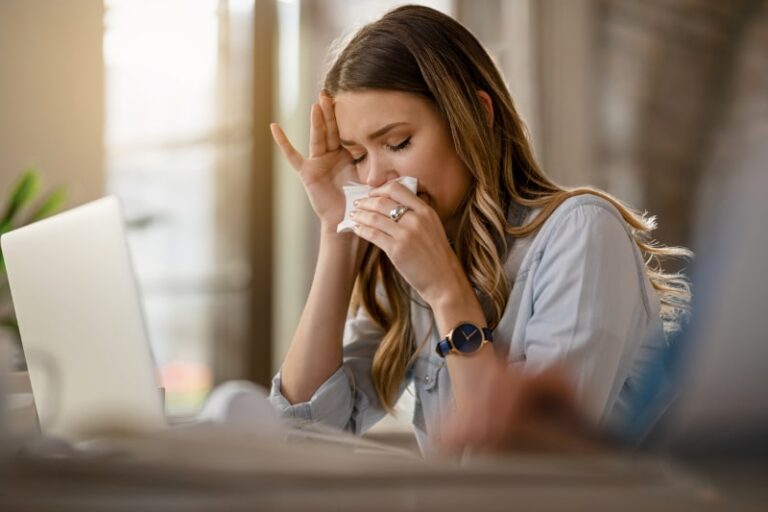 Woman Experiencing Allergy Symptoms